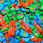 Big pile of wrapped Albert's Flintsones™ assorted fruit flavored chews