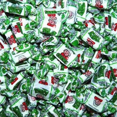 Big pile of wrapped Albert's Green Apple flavored chews